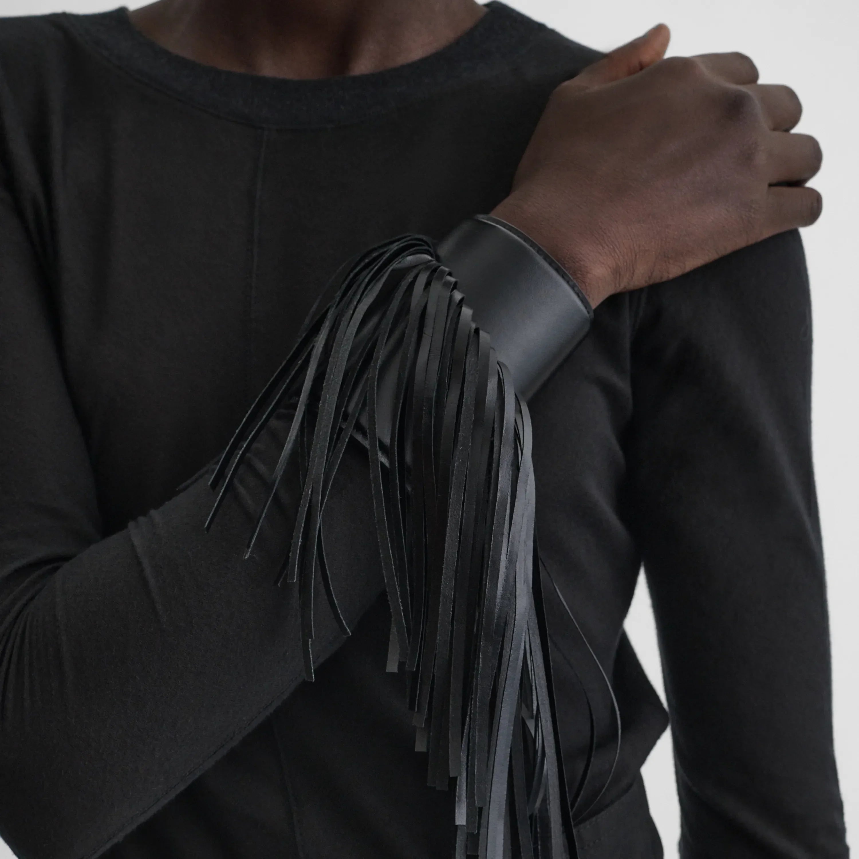 FRINGE CUFF | black leather