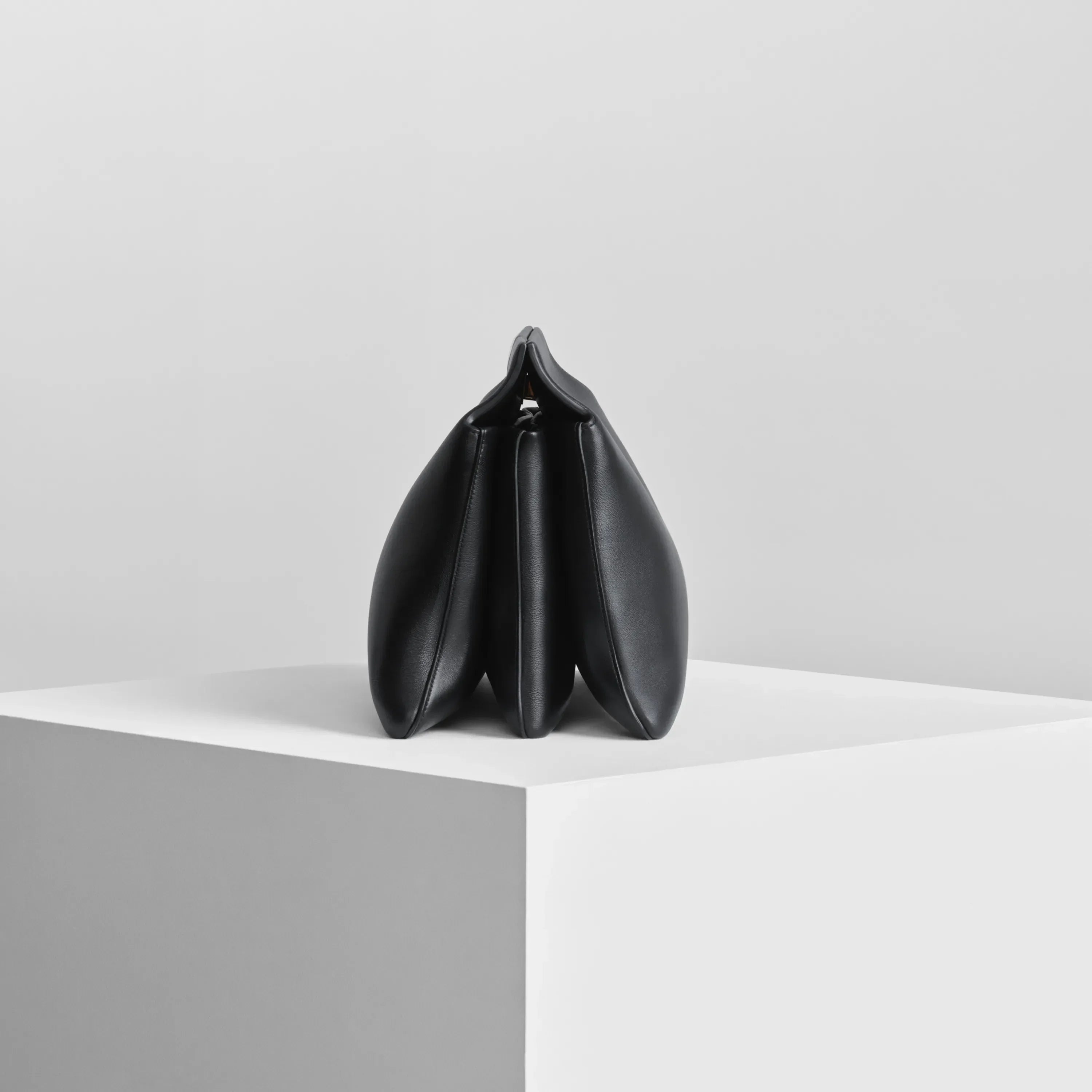 TRIPLEX CLUTCH | black leather with gold
